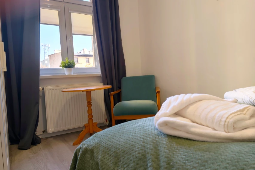 Komfortowa sypialnia w Apartamencie Kochanowskiego